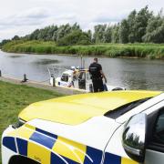 A man missing after a boat capsized has been named