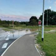The Acle A47 slip road has been closed after a burst water main caused flooding