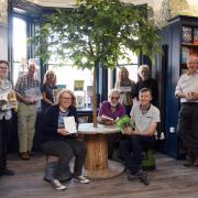 Tracy Kenny, front centre left, director and co-founder, and Richard Hall, project manager, front centre right, of the award-winning Kett's Books