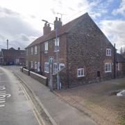 The new property was proposed to be built behind an existing house on the High Street at Heacham