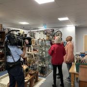 Raj Bisham filming The Warehouse Antiques & Collectables in Setchey
