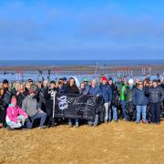 Volunteers assemble for the start of the beach clean at Old Hunstanton