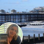 Norwich author Samantha Bentley with her novel The Beach Cafe