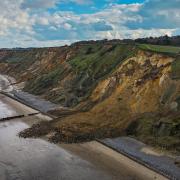Drone footage has captured the extent of the damage to the collapsed cliff in Sidestrand