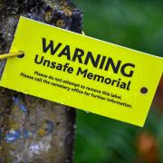 More than 150 'unsafe' memorials in council cemeteries could be laid flat