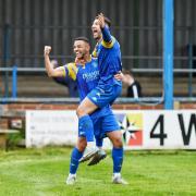 Ross Barrows celebrates the King's Lynn Town equaliser with Jonny Margetts