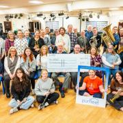 West Norfolk Wind Orchestra has donated funds from it's concert to charity