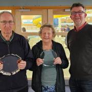 Robert Barrett and Dianne Barrett pictured with Thetford Dolphins chairperson Mark Flood