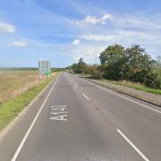 The A140 Cromer Road is closed after emergency services were called to a crash