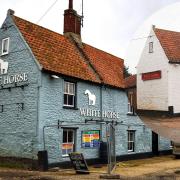 The White Horse at Holme is being restored to its original colour