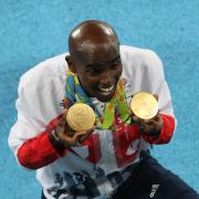 Mo Farah with his gold medals the Rio Olympics