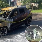 Video footage has captured the moment a car was torched in Catton Grove, showing someone setting alight to something and placing it under the car