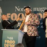 left to right, last year’s host Karl Minns on stage with Edd Watkinson and Jude Porter from The Bodega, which won Best Newcomer, and Hannah Winter (award sponsor - Bread Source)