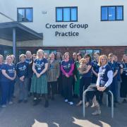 Staff at Cromer Group Practice are taking part in a half-marathon walk at the north Norfolk coast this Saturday (May 18) to raise money for local charity Cromer Cares. Staff wearing t-shirts generously supplied by Little Pickle Design