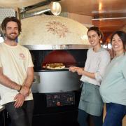 The owners of Flour Pizza, newly opened at Wells' Quay. From left, Matt Jarvis, Dulcie Browne, and Kiki Alvarez