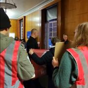 Acorn members disrupt a council meeting in Norwich
