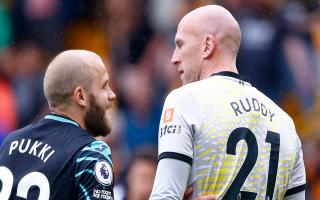 Teemu Pukki shares a word with John Ruddy at the end of Norwich City's 1-1 Premier League draw at Wolves
