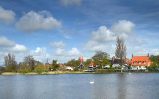 Thorpeness Meare where you can hire a rowing boat and explore the Peter Pan themed islands.