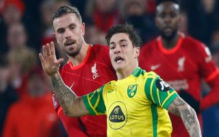 Mathias Normann tussles with Jordan Henderson in Norwich City's 2-1 FA Cup defeat to Liverpool