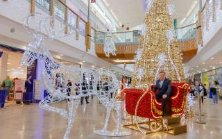 Paul McCarthy, general manager of Chantry Place, in Santa's sleigh in the shopping centre