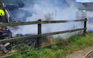 A shed and workshop have been destroyed in a blaze