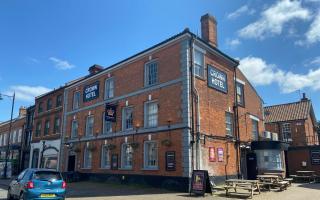 Drinkers at The Crown Hotel in Watton, Norfolk, came under fire from a gunman who shot down on them from his flat window after being thrown thrown out twice that night